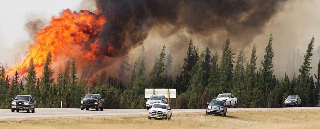 cars running from fire