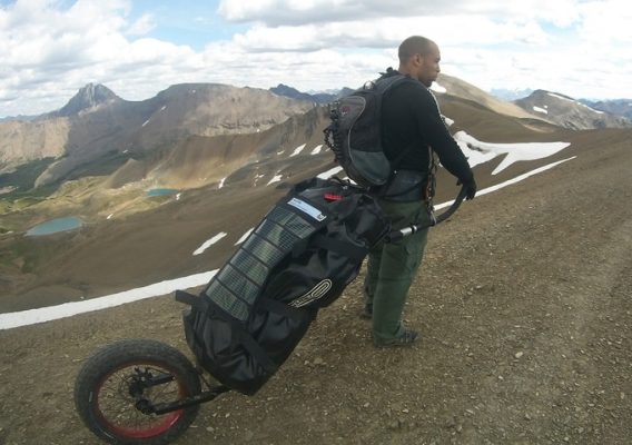 a man with a bag in a one wheel