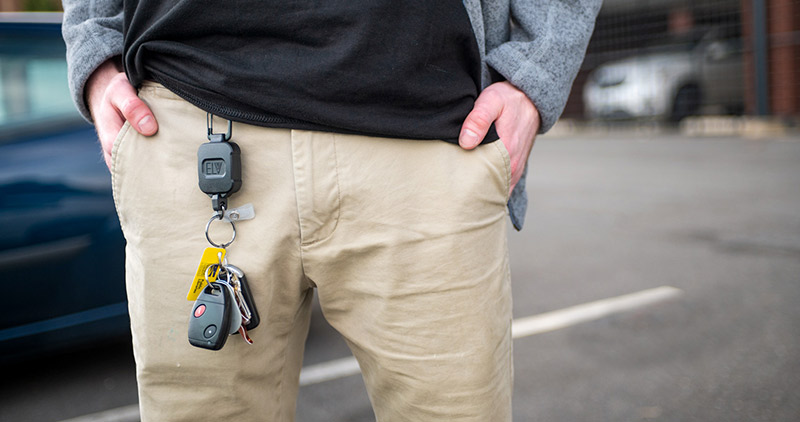 Man Putting her Hands in pocket with Self-Defense Keychain 
