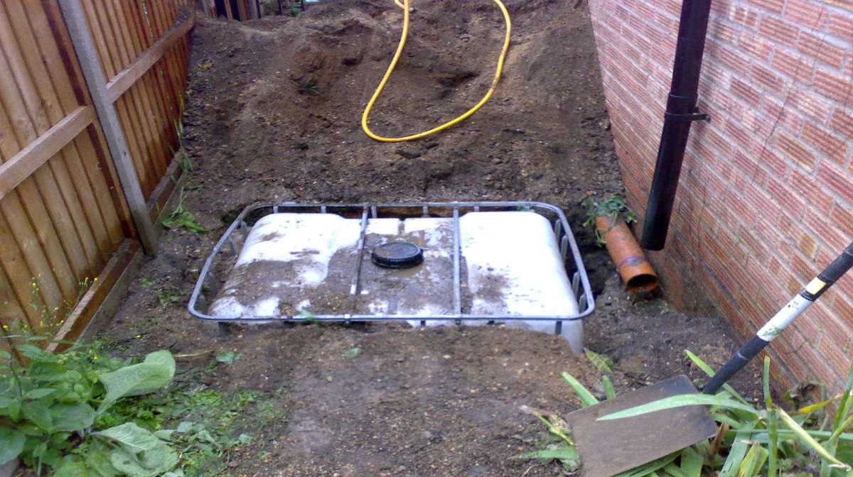 A water tank buried underground.
