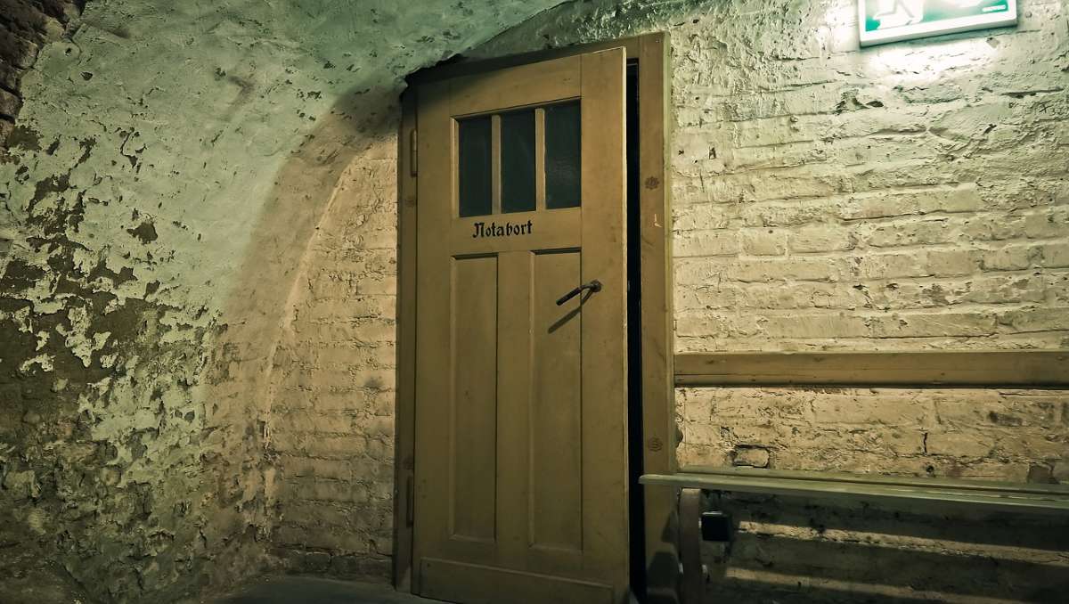 The entrance door of an underground bunker.